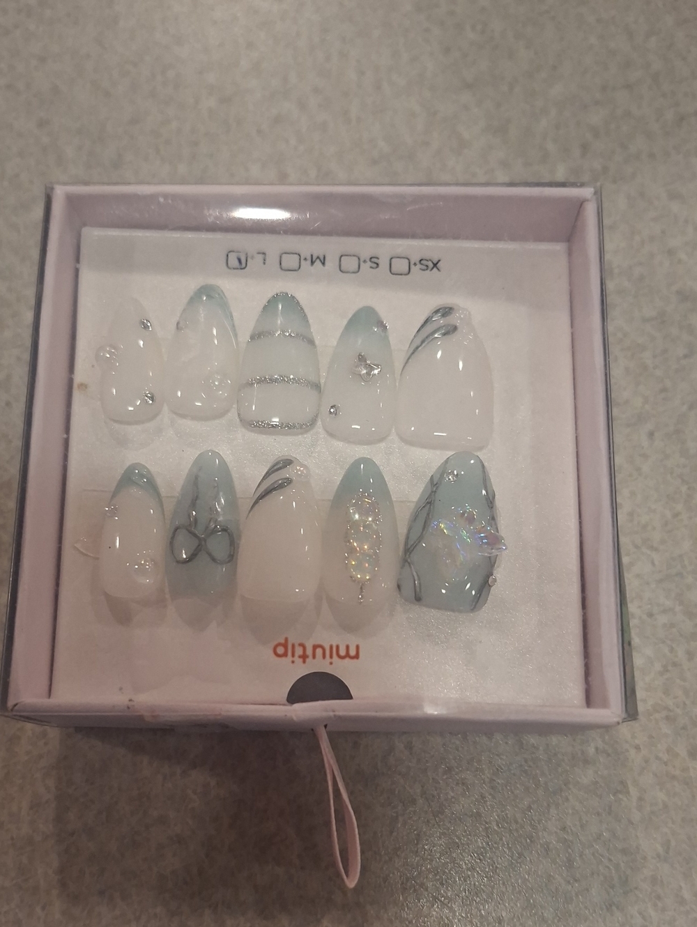 Soft Blue Marble Press-On Nail Set with Iridescent Accents